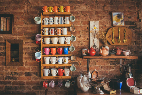 rack of mugs in a kitchen