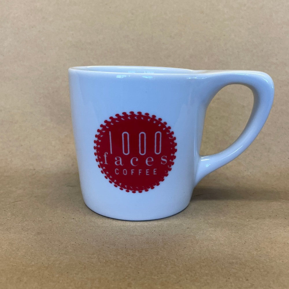 1000 Faces Coffee Mug