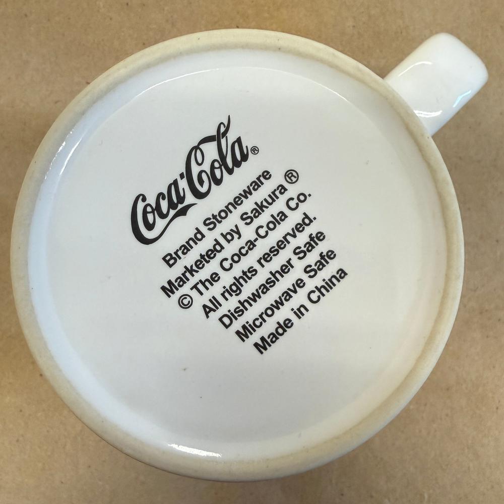 Coca-Cola Polar Bears Surfing by Sakura Mug