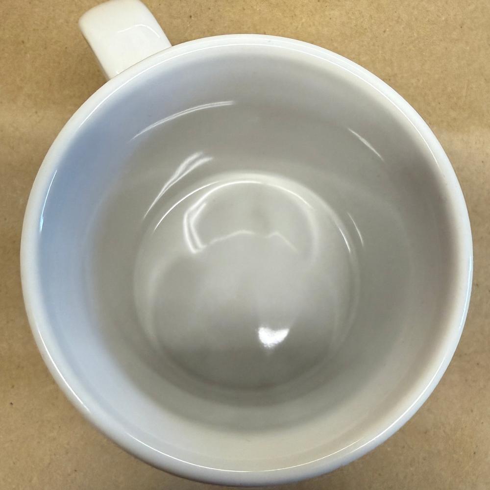 Coca-Cola Sun Bathing Polar Bear by Sakura Mug