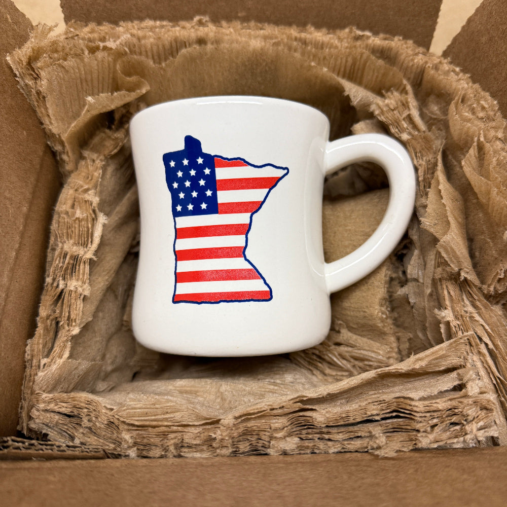 MN mug in packaging