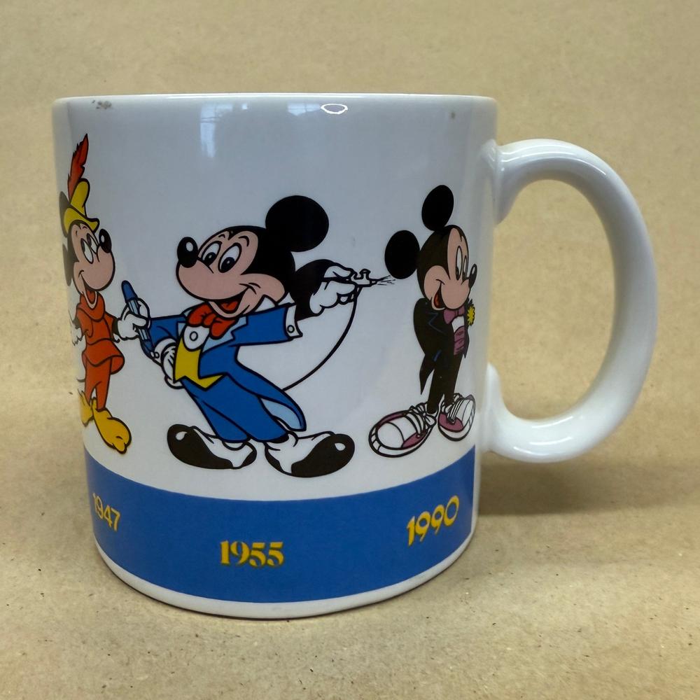Disney Applause Mickey Draws Mickey Through the Years Mug-1990
