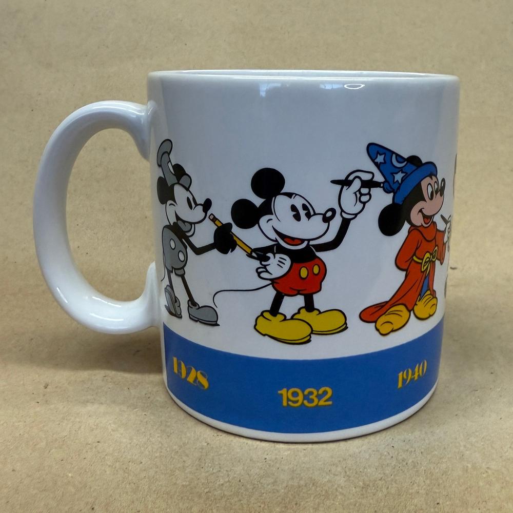 Disney Applause Mickey Draws Mickey Through the Years Mug-1990