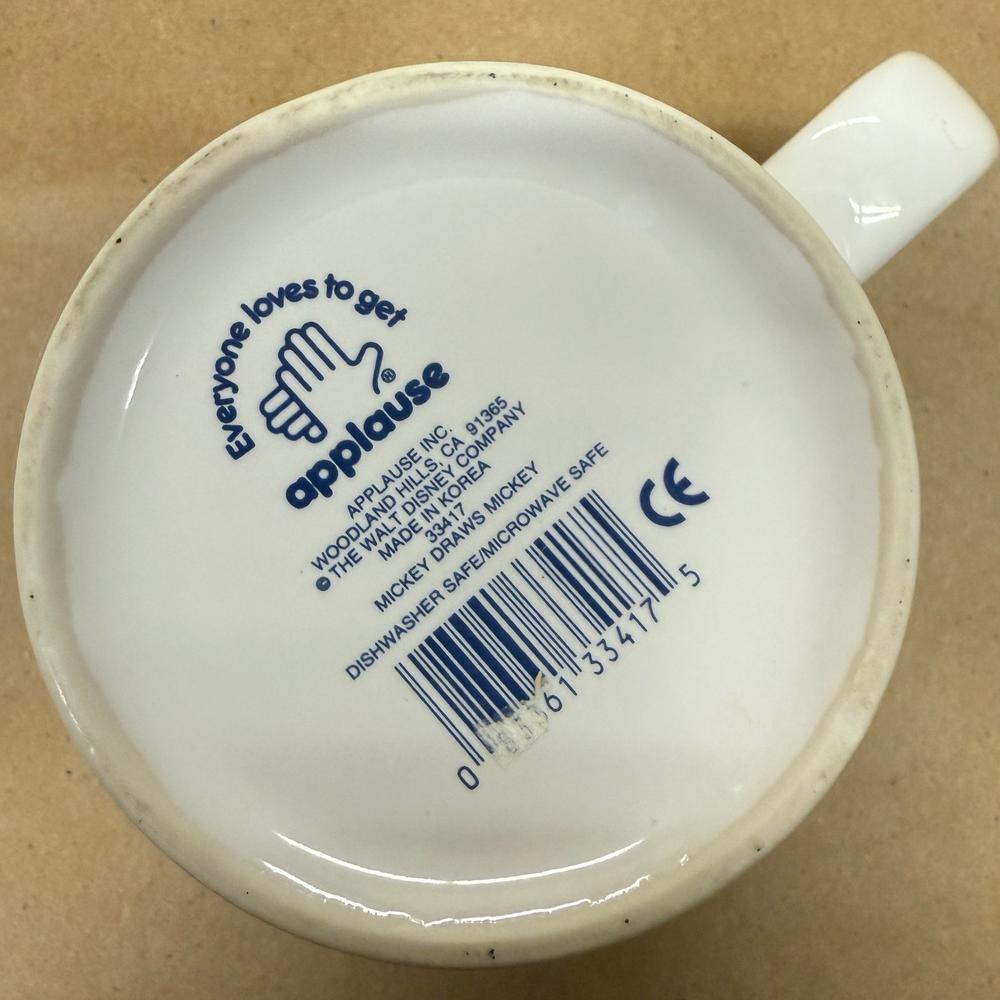 Disney Applause Mickey Draws Mickey Through the Years Mug-1990