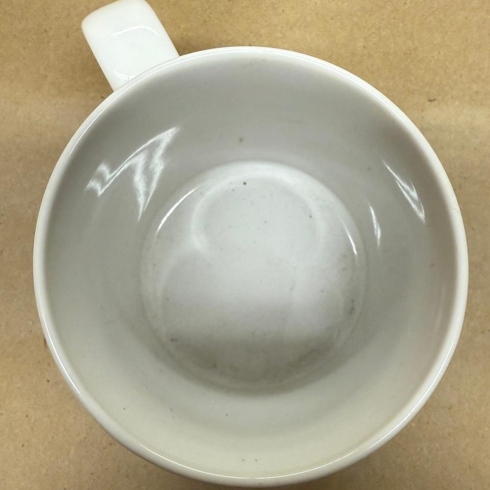 Disney Applause Mickey Draws Mickey Through the Years Mug-1990