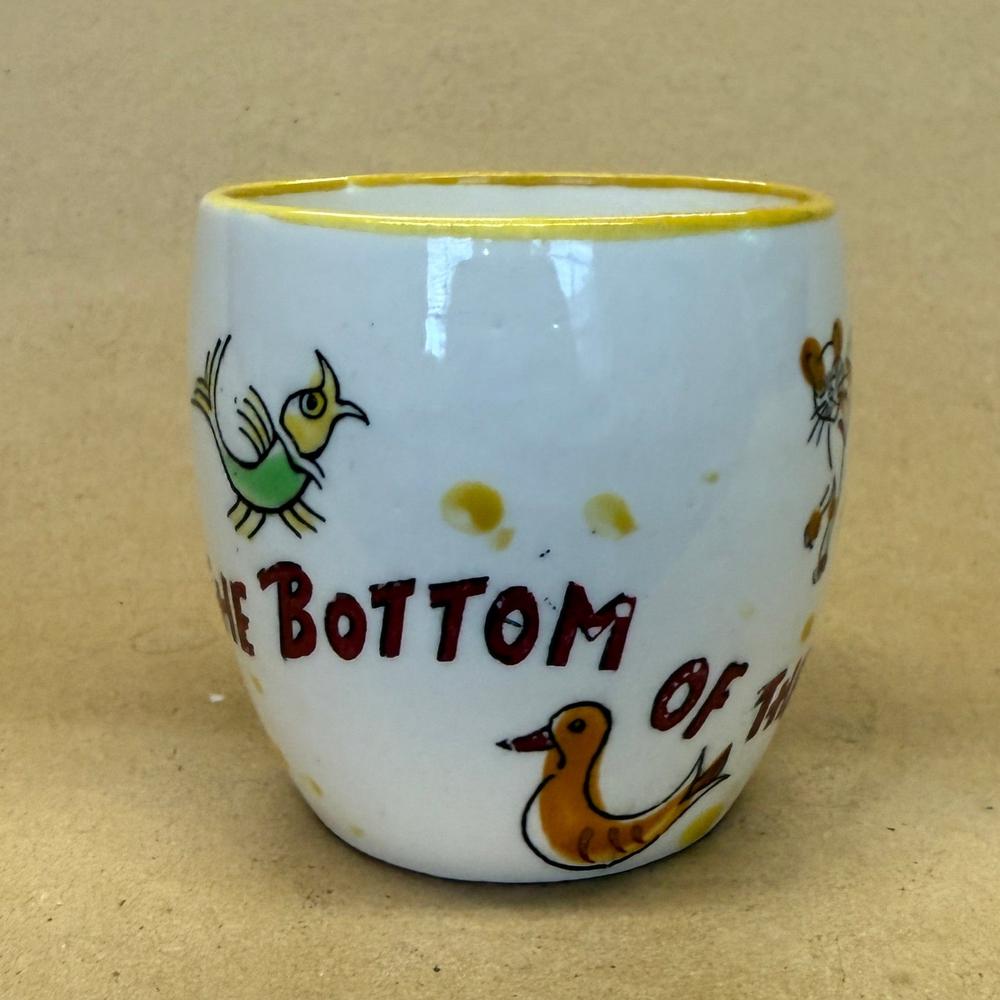 NASCO Mystery What's at the Bottom of the Well Dog Mug