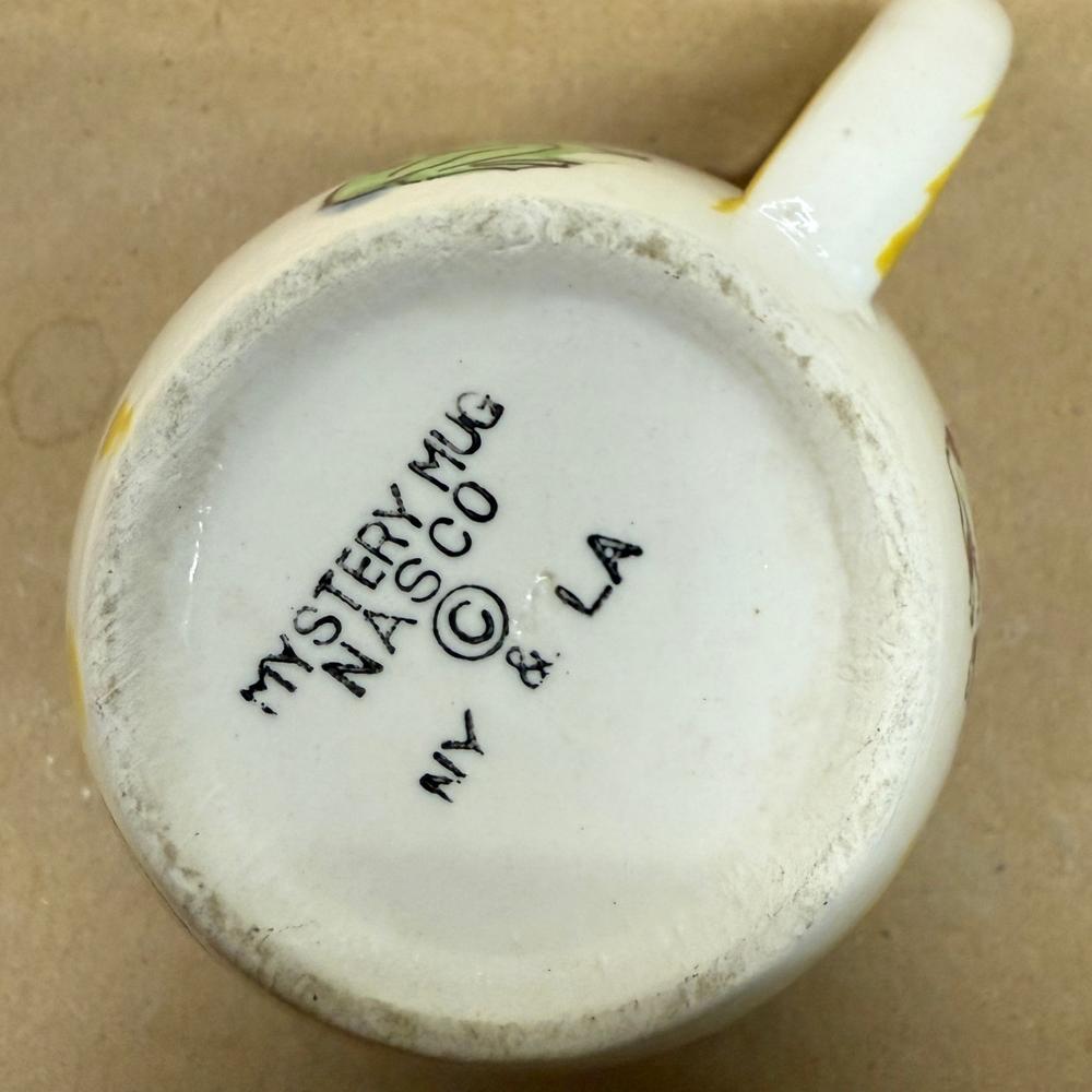 NASCO Mystery What's at the Bottom of the Well Dog Mug