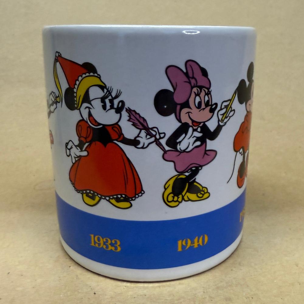 Disney Applause Minnie Draws Minnie Through the Years Mug-1990 NIB