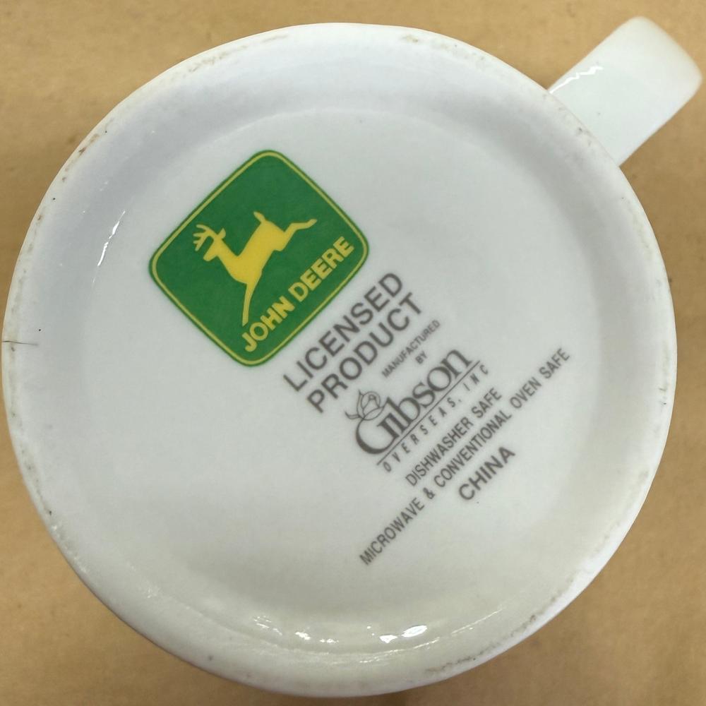 John Deere Tractor Plowing Waving at Plane Mug