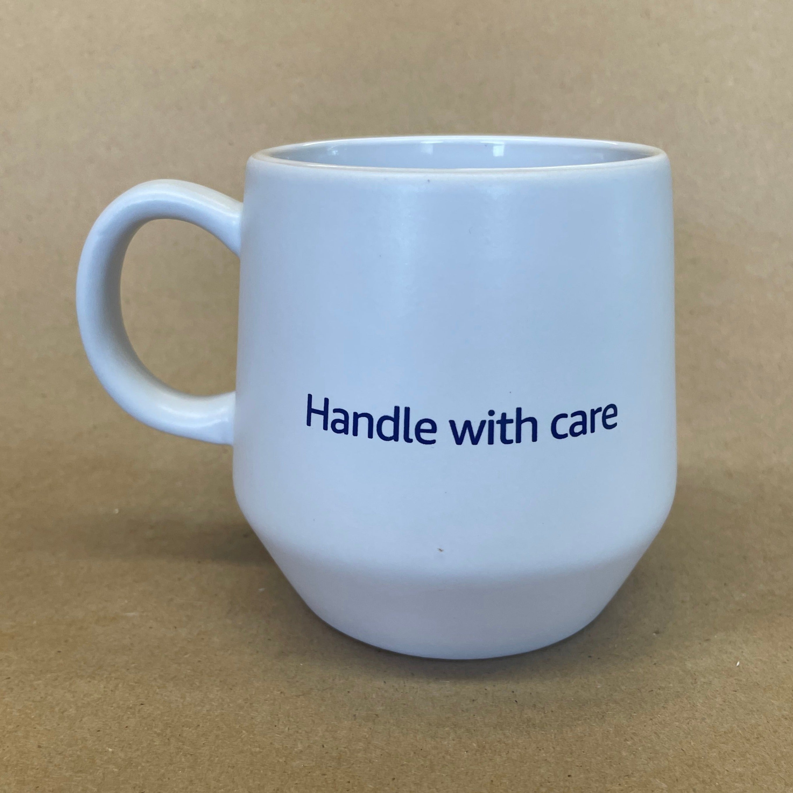 Amazon Handle With Care Mug