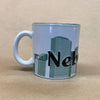 Nebraska The Cornhuster State Embossed Mug